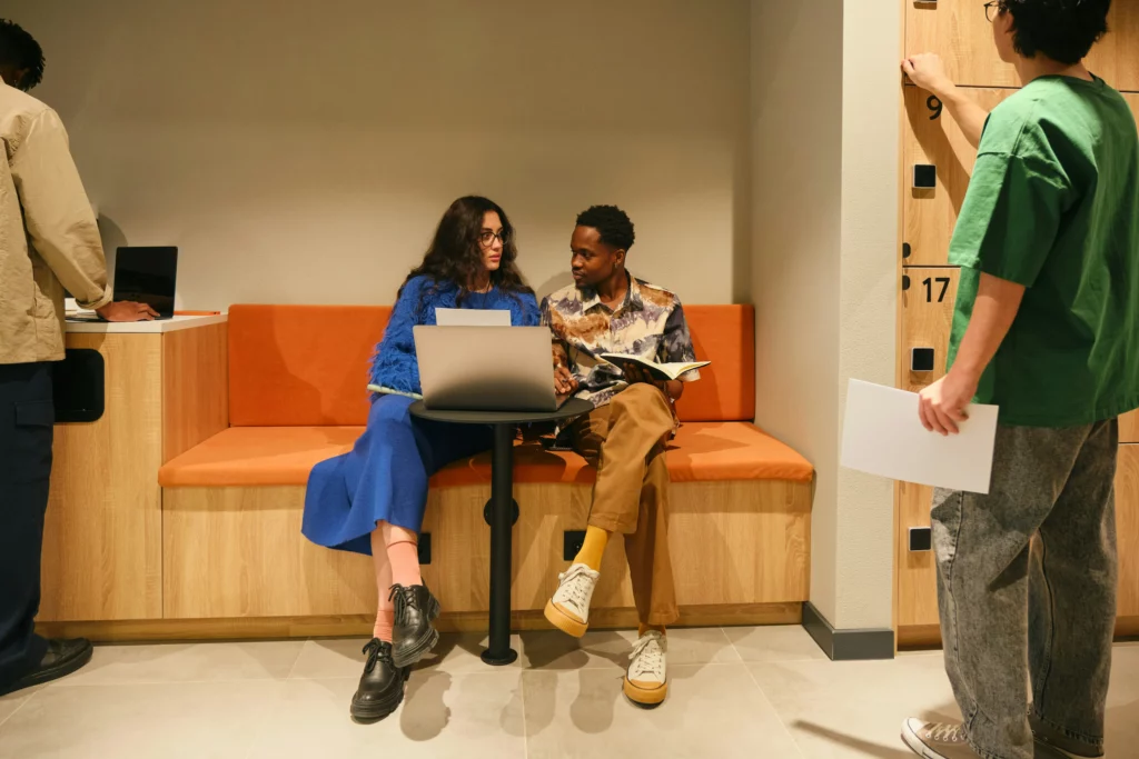 people sitting on coach